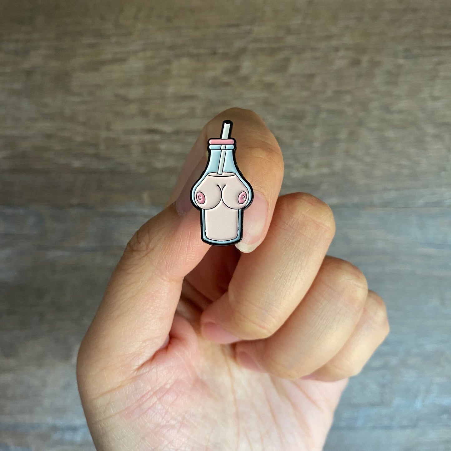 Boob Juice Boobies in a Bottle Enamel Pin - thehappypin